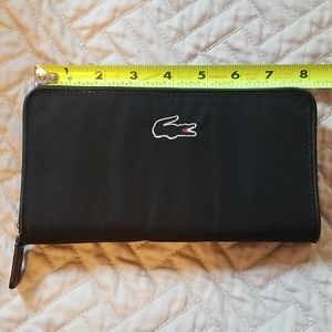 Brand new lacoste accordion wallet zip around